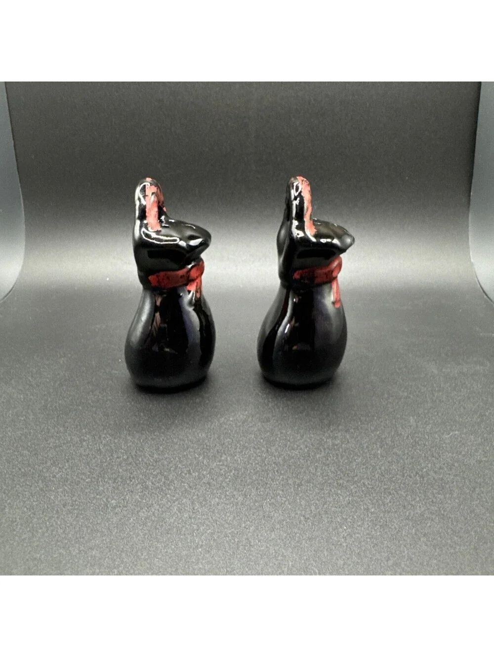 Vintage Black Ceramic Sack Salt and Pepper Shakers Red Bow Handled Set